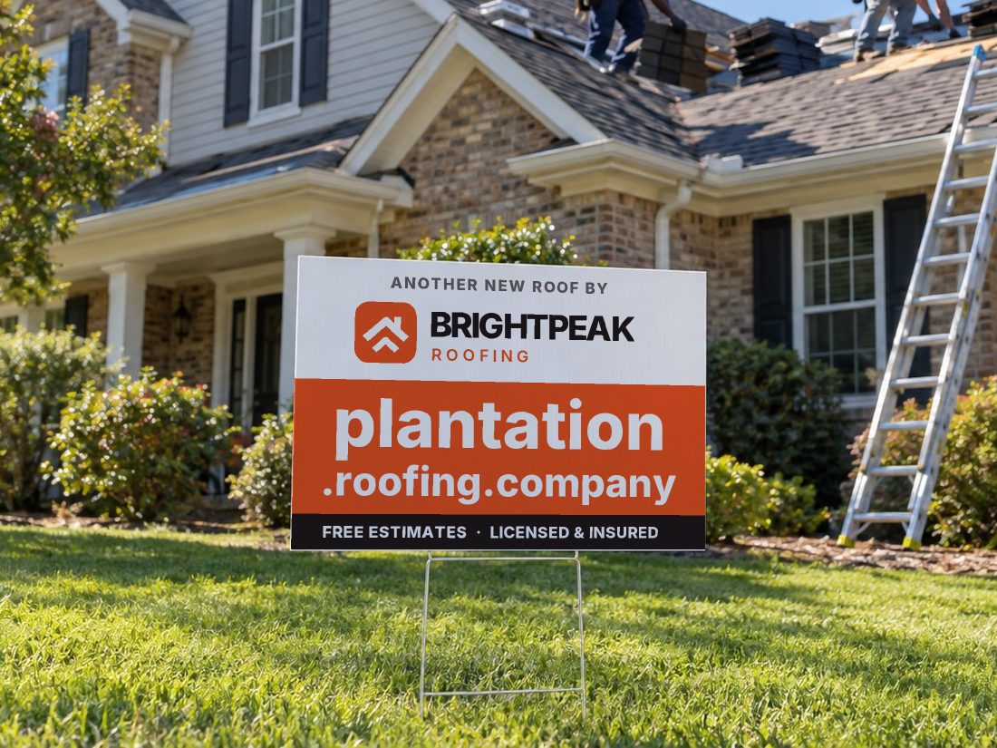 plantation.roofing.company on a yard sign in front of a house getting a new roof